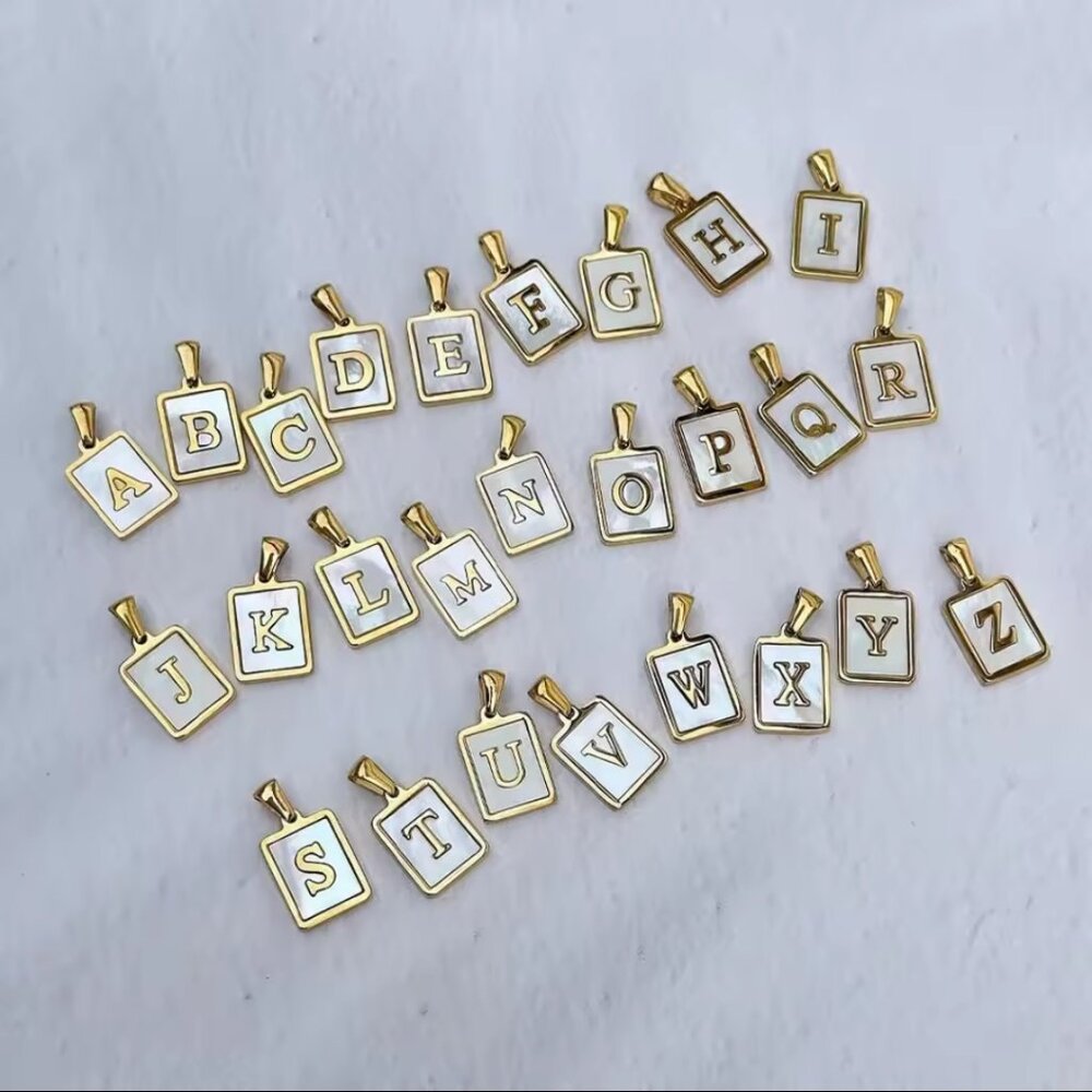 Mother of pearl gold stainless steel necklace.